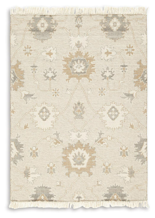 Ashley Furniture Calkin Rug with intricate patterns and warm tones, showcasing a soft, woven texture for cozy living spaces.