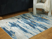 Medium washable rug from Ashley Furniture featuring a textured design in neutral tones, perfect for modern home decor.