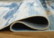 Medium washable rug from Ashley Furniture, detailed view showing soft, durable fabric and neutral color for modern home decor.