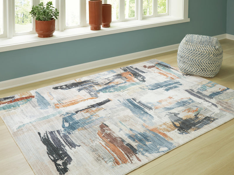 Ashley Furniture Hessland washable rug in a 4x3 foot size, featuring a modern design and soft, durable fabric.