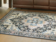 Ashley Furniture Leningston washable rug with a patterned design in neutral tones, 4x3 feet, cropped view.