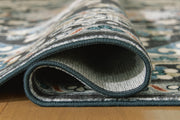 Ashley Furniture Leningston washable rug with intricate pattern and soft texture, shown in close-up detail.