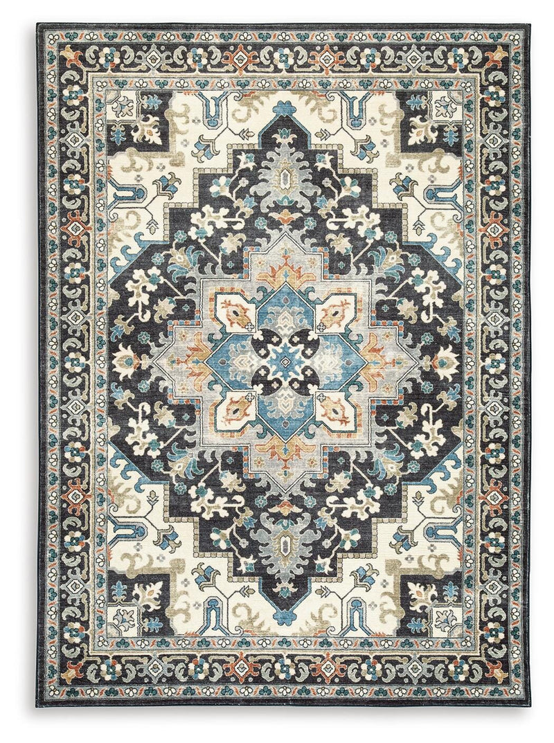 Ashley Furniture Leningston washable rug with a patterned design, featuring soft fabric and durable construction for versatile home decor.