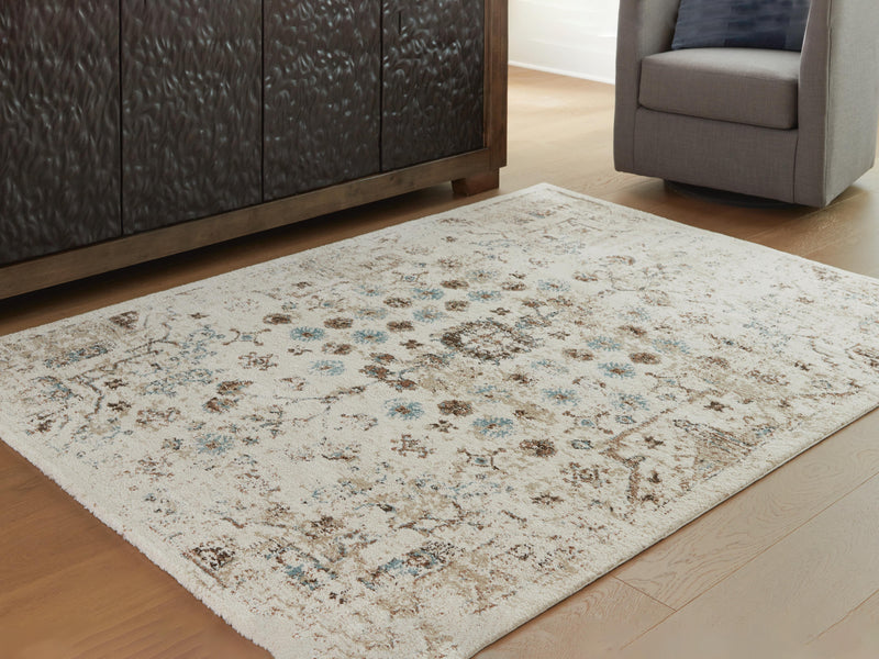 Ashley Furniture Jossler Rug in 4x3 feet with a textured design, featuring warm earth tones and a soft woven surface.