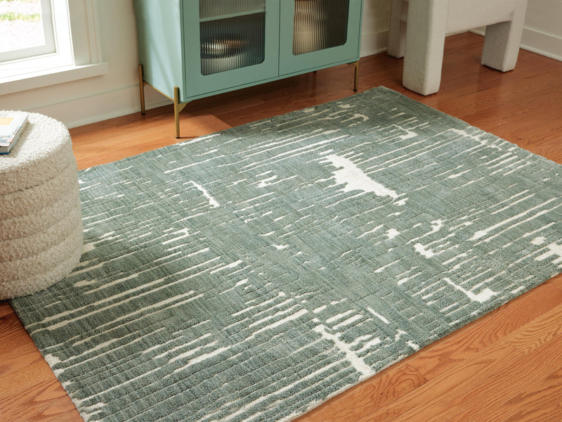 Ashley Furniture Cayworth Rug in 4x3 ft with a textured, woven design, perfect for adding style to living or bedroom spaces.