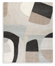 Large Ashley Furniture Edrickhill 8' x 10' rug with intricate patterns, perfect for adding style to any room.