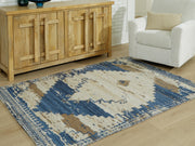 Ashley Furniture Varnler Rug in a 4x3 foot size featuring a modern geometric pattern and soft, durable woven fabric.