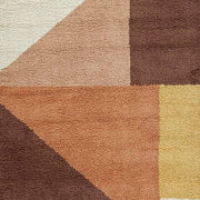 Ashley Furniture Gailmore Rug swatch showing textured, patterned fabric in neutral tones, perfect for adding warmth to a living space.