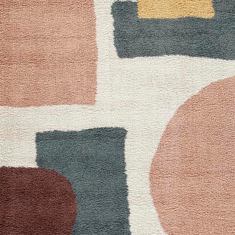 Ashley Furniture Flynnwick Rug in neutral tones, showcasing a plush, textured fabric swatch for home decor.