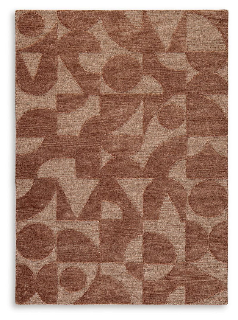 Ashley Furniture Perrenton Rug with intricate pattern in warm tones, showcasing plush texture and detailed design.