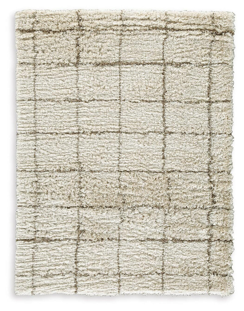 Ashley Furniture Wrenlow Rug with intricate patterns and warm tones, perfect for adding style to living spaces.