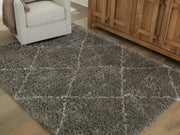 Ashley Furniture Wrenlow Rug in a 4x3 crop, featuring a stylish pattern and soft texture perfect for enhancing home decor.
