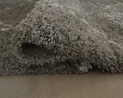 Close-up of the Ashley Furniture Wrenlow Rug showing its detailed woven pattern and soft texture.