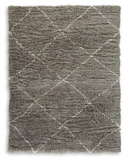 Ashley Furniture Wrenlow Rug featuring a woven pattern in neutral tones, ideal for adding texture to living spaces.