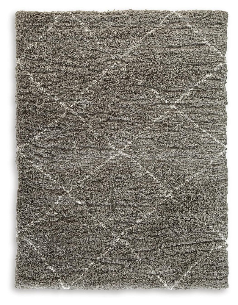 Ashley Furniture Wrenlow Rug featuring a woven pattern in neutral tones, ideal for adding texture to living spaces.