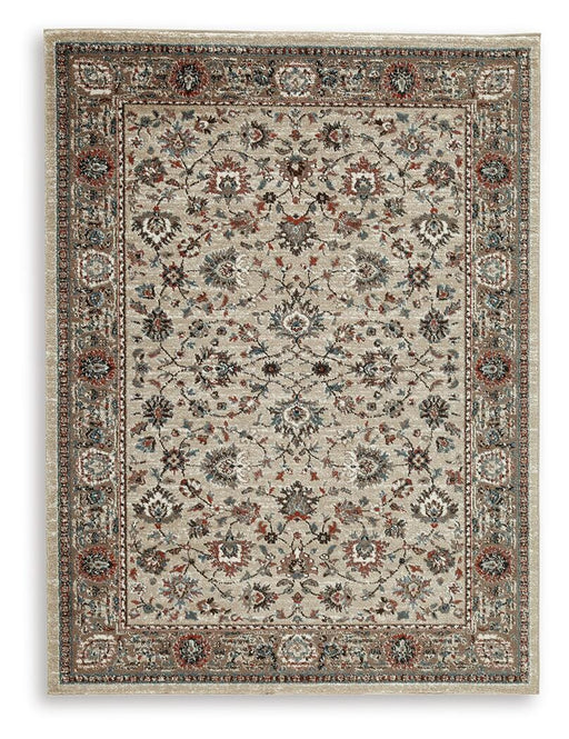 Ashley Furniture Beritham Rug with intricate patterns and soft texture, showcasing a stylish and comfortable floor covering.