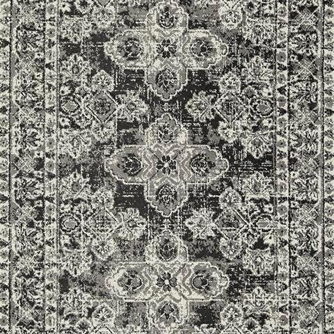 Ashley Furniture Glennisman medium rug featuring a soft, textured surface in neutral tones, ideal for living room or bedroom decor.