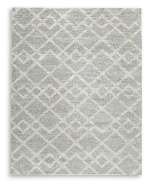 Large Ashley Furniture Unawick Rug with intricate woven pattern in neutral tones, perfect for living room or bedroom decor.
