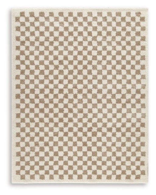Large Ashley Furniture Karamen rug with intricate pattern and soft texture, perfect for living room or bedroom decor.
