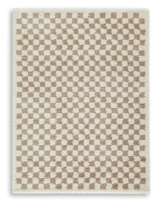 Medium Karamen rug by Ashley Furniture featuring intricate patterns and warm tones, ideal for living room or bedroom decor.