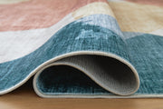 Large Ashley Furniture Chanleigh washable area rug, 7'6" x 9'6", with detailed pattern and soft texture in neutral tones.