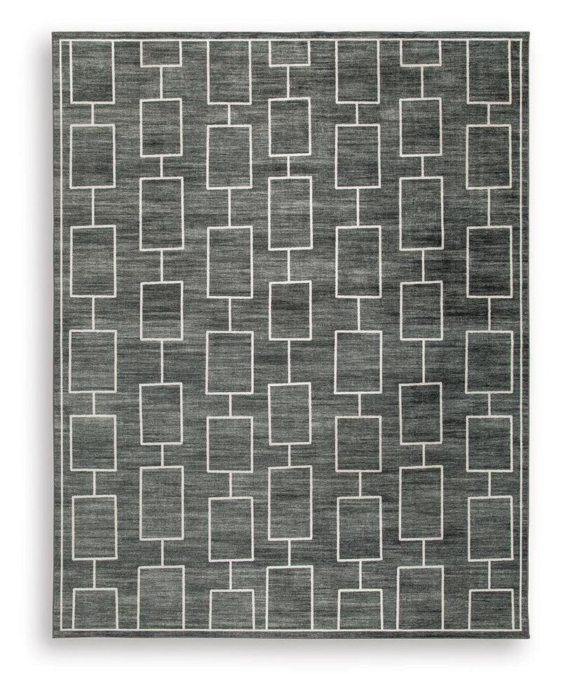 Large Ashley Furniture Elderland washable area rug, 7'6" x 9'6" with intricate pattern and soft texture, perfect for living spaces.