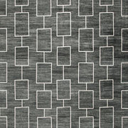 Large Ashley Furniture Elderland washable area rug, 7'6" x 9'6", featuring a soft, patterned design for living room decor.