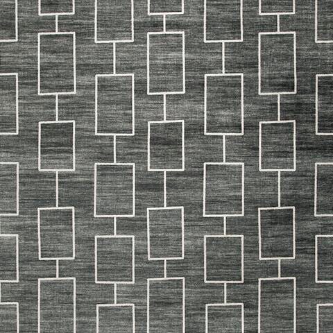 Large Ashley Furniture Elderland washable area rug, 7'6" x 9'6", featuring a soft, patterned design for living room decor.