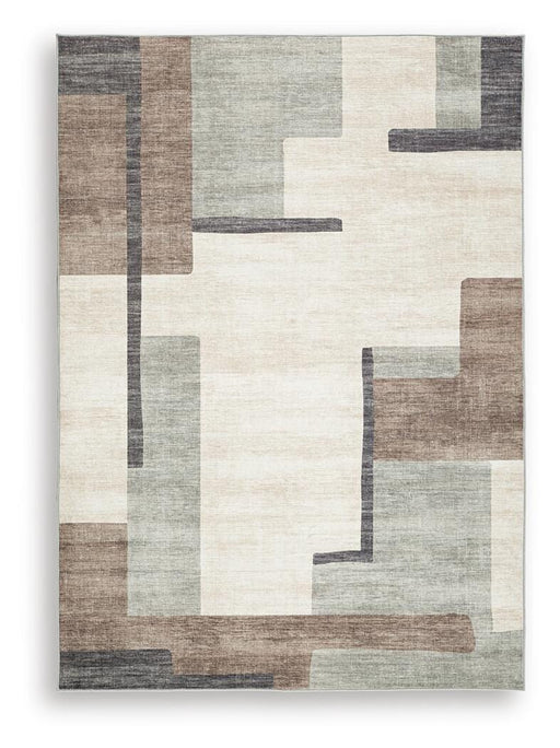 Medium washable area rug by Ashley Furniture featuring a soft, patterned design suitable for living rooms and bedrooms.