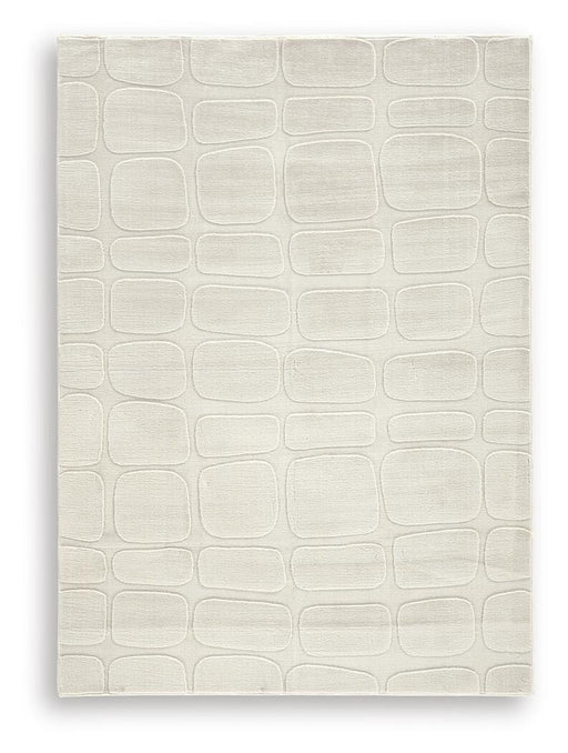 Medium washable area rug by Ashley Furniture featuring a soft, durable design with a stylish pattern in neutral tones.