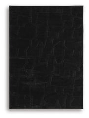 Medium Ashley Furniture Gibbswell washable 5x7 area rug with a soft, textured design on a neutral background.