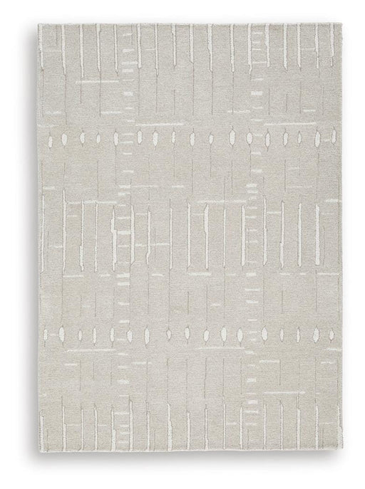 Medium Ashley Furniture Wolbert 5x7 area rug with intricate pattern, soft texture, and modern design for living room decor.