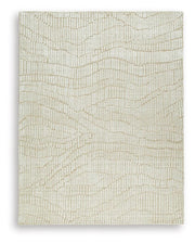 Ashley Furniture Jaseena area rug with intricate pattern in neutral tones, perfect for living room or bedroom decor.