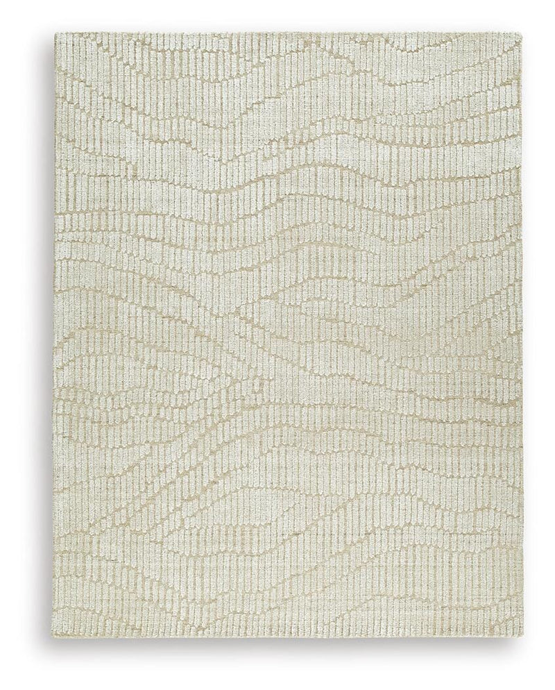 Ashley Furniture Jaseena area rug with intricate pattern in neutral tones, perfect for living room or bedroom decor.