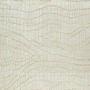 Ashley Furniture Jaseena area rug with intricate patterns in neutral tones, showcasing soft woven texture and decorative design.