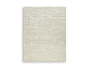 Ashley Furniture Jaseena area rug with intricate pattern in neutral tones, suitable for living rooms or bedrooms.