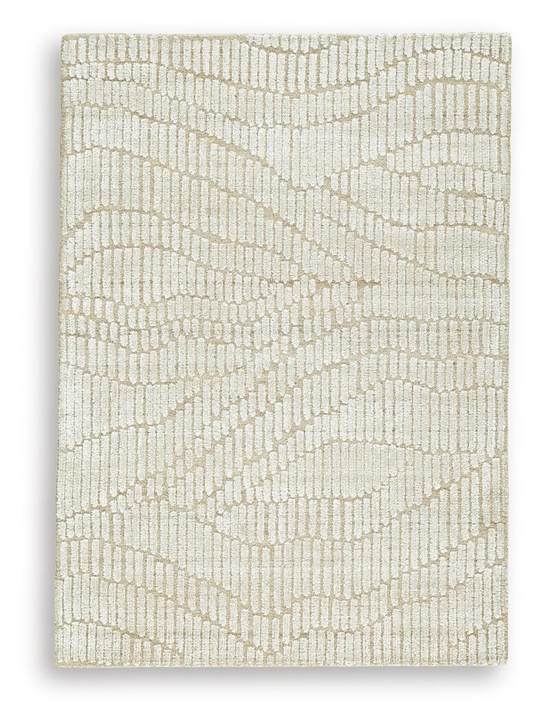 Ashley Furniture Jaseena area rug with intricate patterns in neutral tones, perfect for living room or bedroom decor.