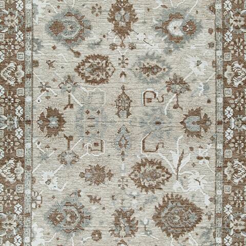 Ainswick memory foam rug by Ashley Furniture featuring a plush, textured surface in a neutral color for cozy home decor.