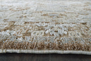 Close-up of Ashley Furniture Ainswick Memory Foam Rug showcasing soft, plush texture and detailed design on a neutral background.