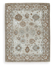 Ashley Furniture Ainswick memory foam rug with plush texture and modern design, ideal for living room or bedroom decor.