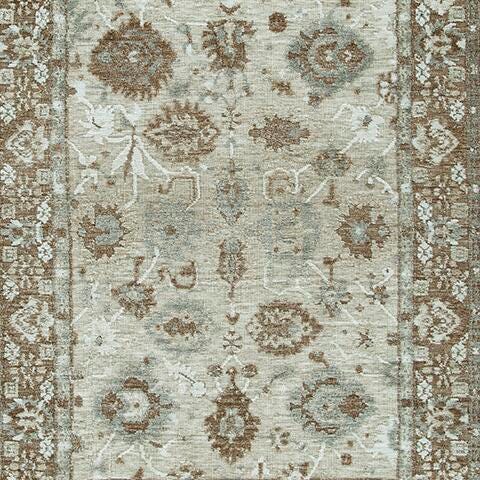 Ashley Furniture Ainswick memory foam rug in neutral tones, showcasing soft, plush surface and textured design for cozy comfort.