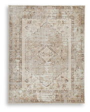 Ashley Furniture Livdon washable rug with geometric pattern in neutral tones, perfect for living rooms and high-traffic areas.