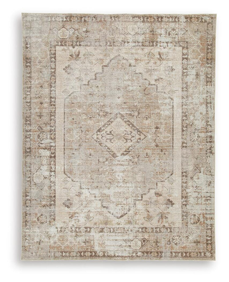 Ashley Furniture Livdon washable rug with geometric pattern in neutral tones, perfect for living rooms and high-traffic areas.