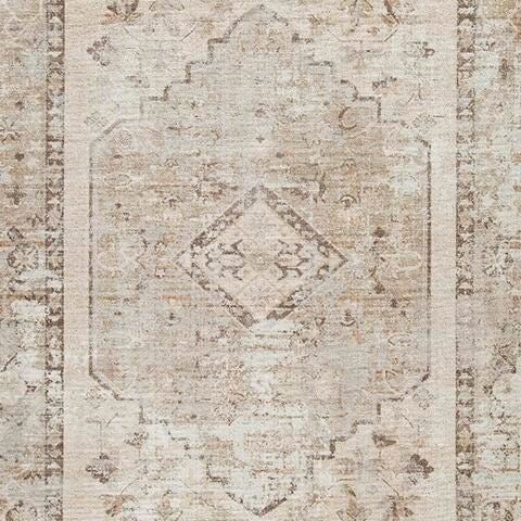 Swatch of Ashley Furniture Livdon washable rug featuring a soft, patterned fabric in neutral tones for living room decor.