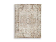 Ashley Furniture Livdon washable rug with a soft, patterned design in neutral tones, ideal for living room or bedroom decor.