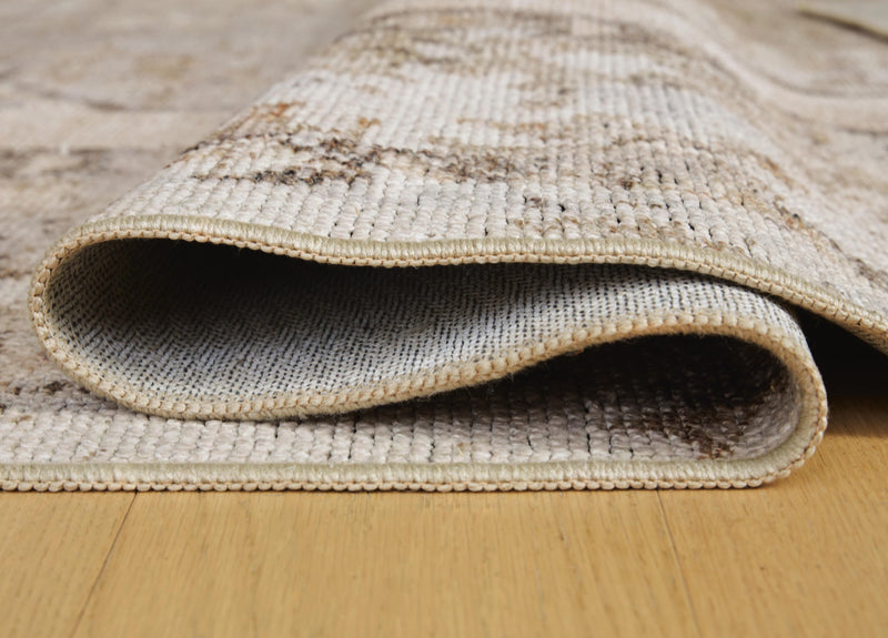 Ashley Furniture Livdon washable rug with detailed pattern, showcasing its soft, durable fabric and stylish design.