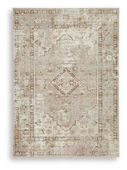 Ashley Furniture Livdon washable rug with geometric pattern in neutral tones, ideal for living room or bedroom decor.
