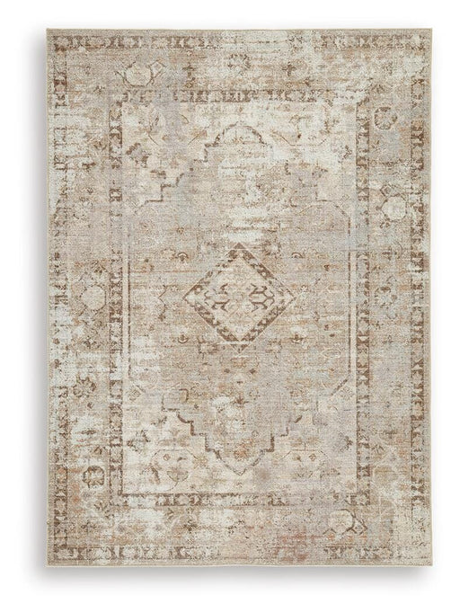 Ashley Furniture Livdon washable rug with geometric pattern in neutral tones, ideal for living room or bedroom decor.