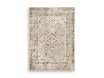 Ashley Furniture Livdon washable rug featuring a soft, durable fabric with a stylish design, perfect for modern home decor.