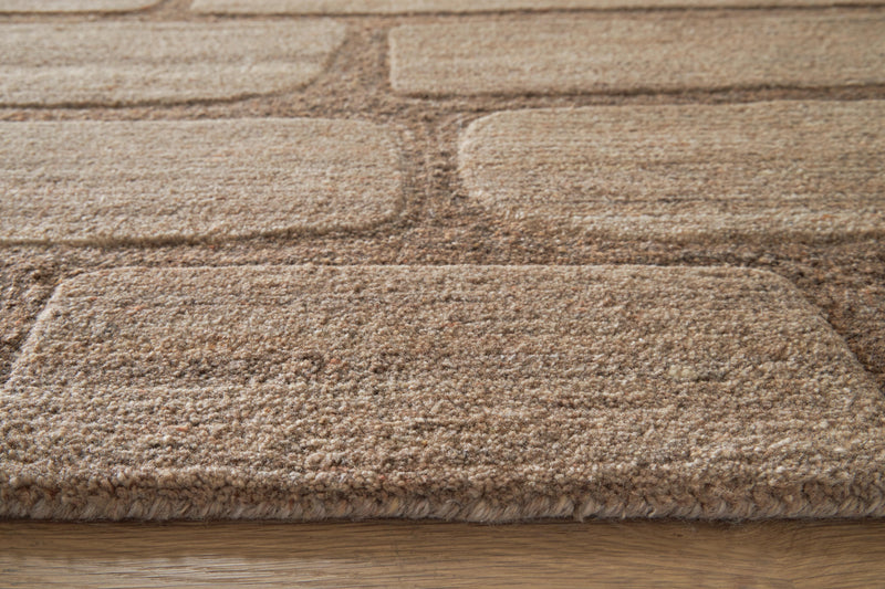 Close-up of the Ashley Furniture Orest Rug showcasing its detailed woven pattern and textured surface.